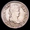 Fernando VII. 1/2 Real. (1,68g.). México. 1820. Ensayador J·J. AC-411. SC. Restos de brillo original. Rara en esta conservación.