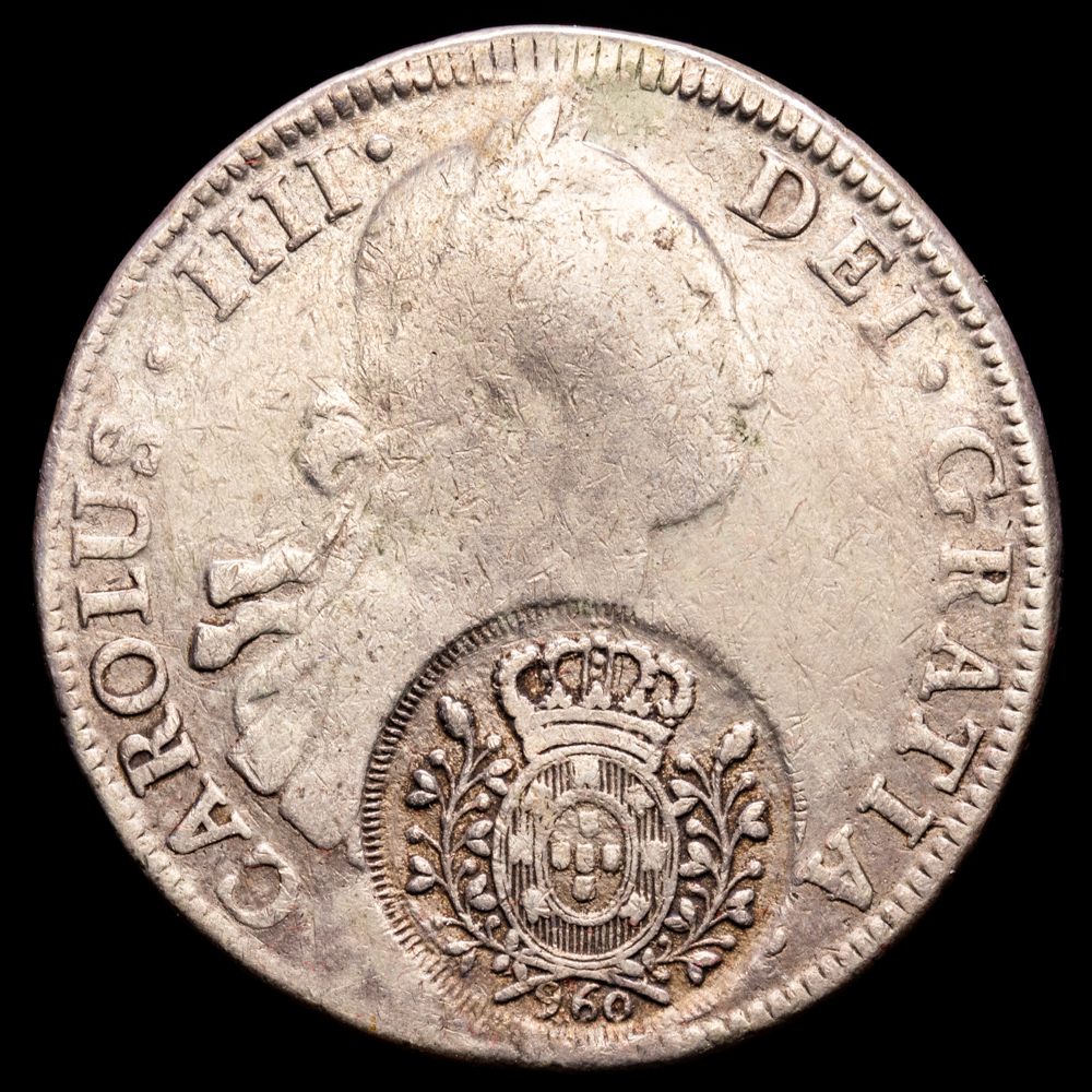 Carlos IV. 8 Reales (g.). Potosi. Ensayador P·P. BC+. Escasa con doble resello de Portugal.