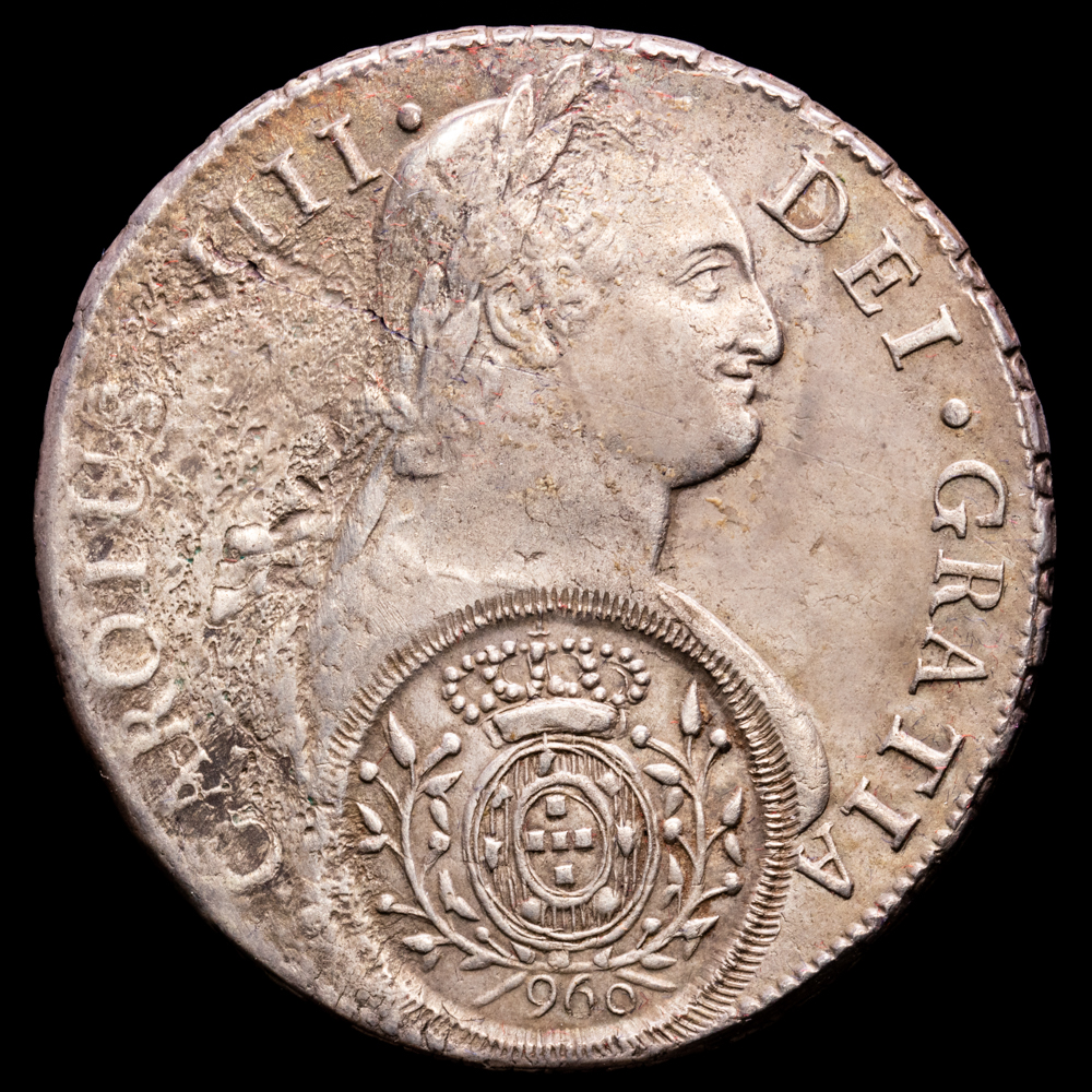 Carlos IV. 8 Reales (g.). Potosi. Ensayador P·J. MBC-. Escasa con doble resello de Portugal.